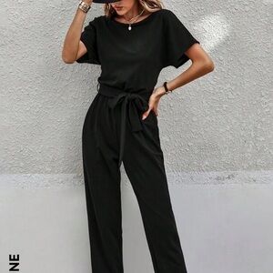 Black jumpsuit with belt